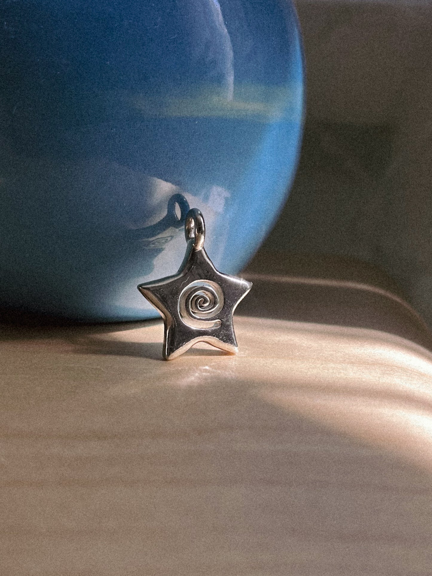 spiral star charm