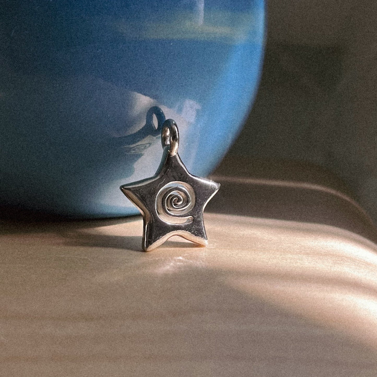 spiral star charm