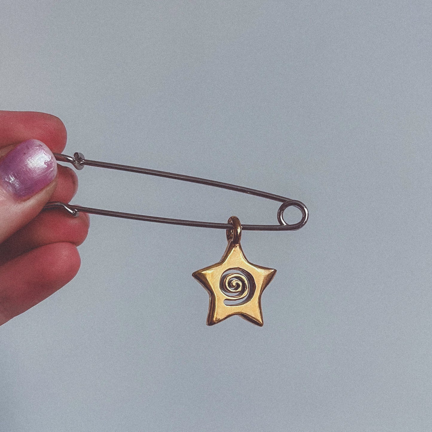 spiral star charm