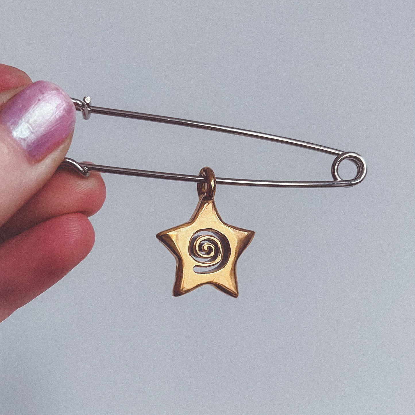 spiral star charm